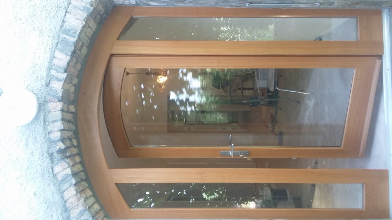 Porte bois vitrée en arche